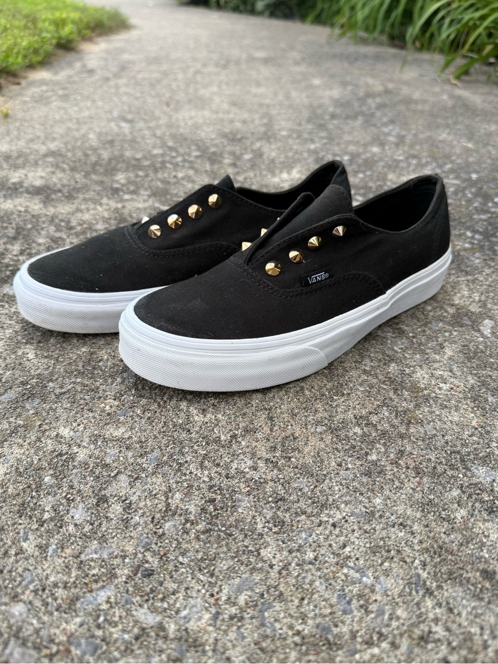 Vans Black Canvas Slip-Ons with Gold Stud Accents